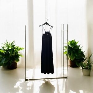 Black tight dress, open from the sides used once but it’s in good condition